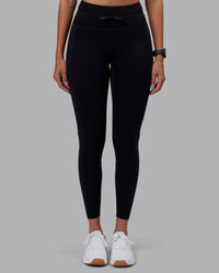 Woman wearing Effortless Drawstring Ultra High-Rise Full Length Legging Pockets - Black | Model:Rhiley | Size:S | Thumbnail Index: 0