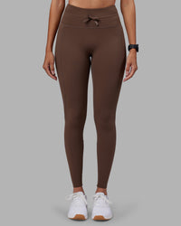 Woman wearing Effortless Drawstring Ultra High-Rise Full Length Legging Pockets - Chocolate Martini | Model:Rhiley | Size:S | Thumbnail Index: 1