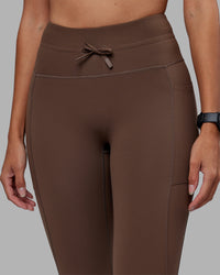 Woman wearing Effortless Drawstring Ultra High-Rise Full Length Legging Pockets - Chocolate Martini | Model:Rhiley | Size:S | Thumbnail Index: 5