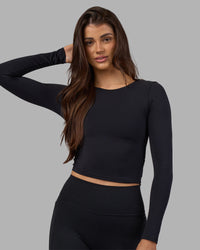 Woman wearing Effortless Long Sleeve Top - Black | Model:Phoebe | Size:S | Thumbnail Index: 7