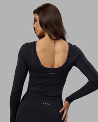 Woman wearing Effortless Long Sleeve Top - Black | Model:Phoebe | Size:S | Thumbnail Index: 3