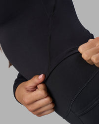 Woman wearing Effortless Long Sleeve Top - Black | Model:Phoebe | Size:S | Thumbnail Index: 6