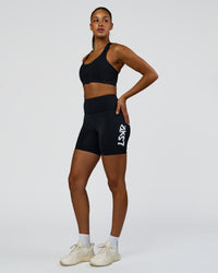 Woman wearing Elarra Zip Front Sports Bra - Black | Model:Rosie | Size:S | Thumbnail Index: 3
