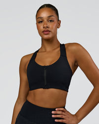 Woman wearing Elarra Zip Front Sports Bra - Black | Model:Rosie | Size:S | Thumbnail Index: 0