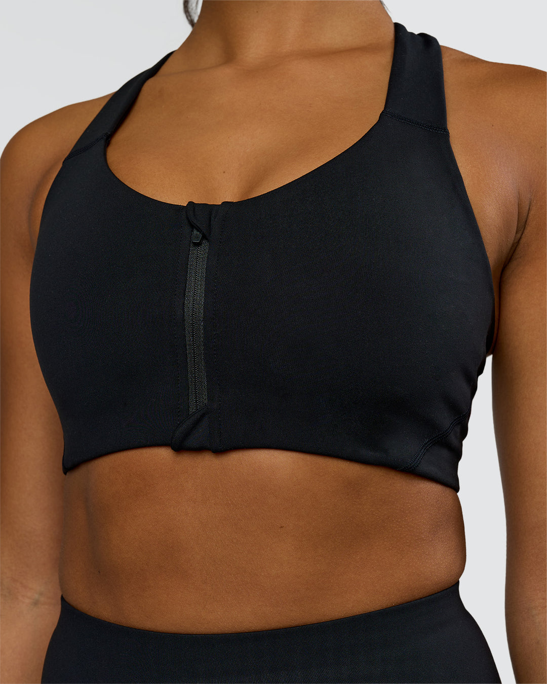 Woman wearing Elarra Zip Front Sports Bra - Black | Model:Rosie | Size:S - view 6