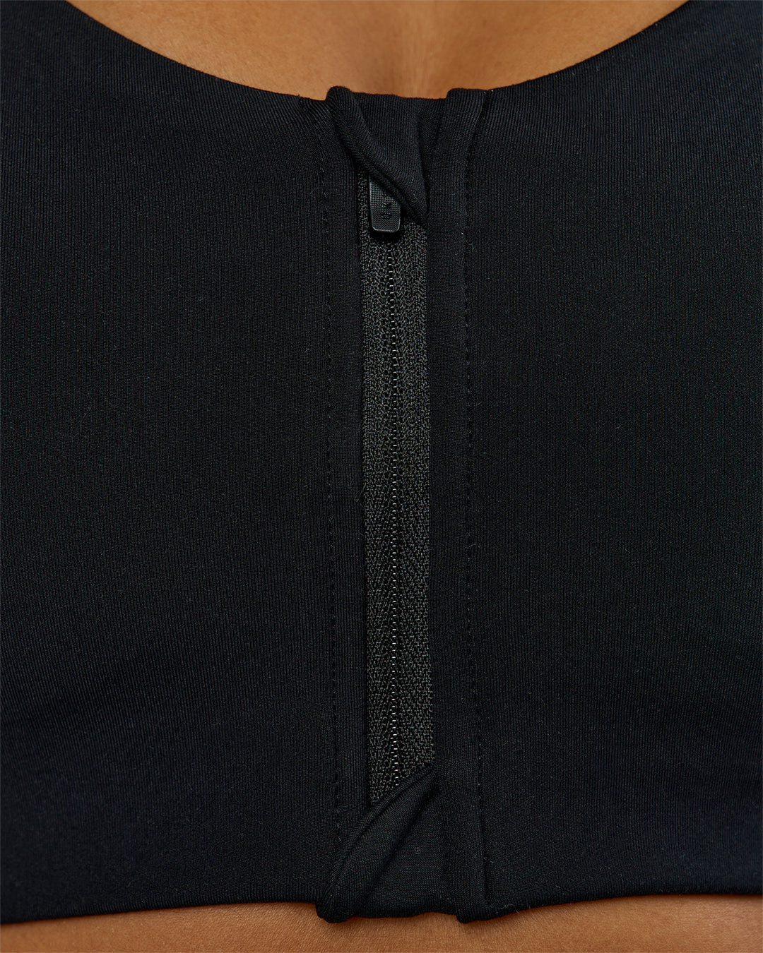 Woman wearing Elarra Zip Front Sports Bra - Black | Model:Rosie | Size:S - view 2