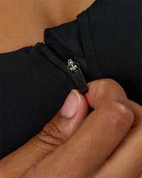 Woman wearing Elarra Zip Front Sports Bra - Black | Model:Rosie | Size:S | Thumbnail Index: 4