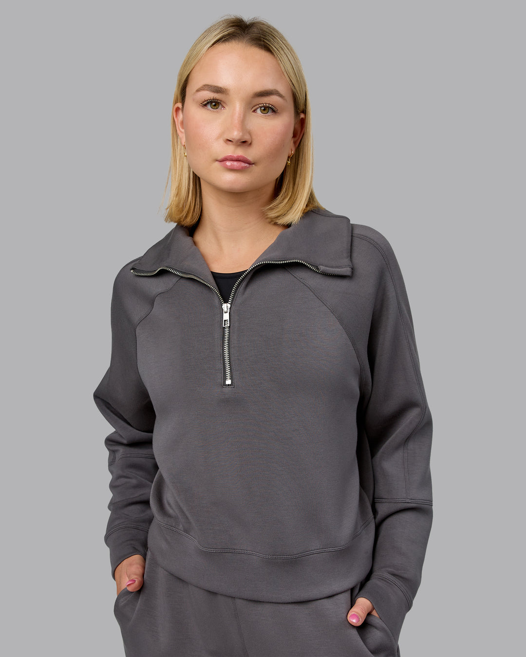 Woman wearing Elevate SoftTouch 1/2 Zip Sweater - Asphalt | Model:Halle | Size:S - view 1