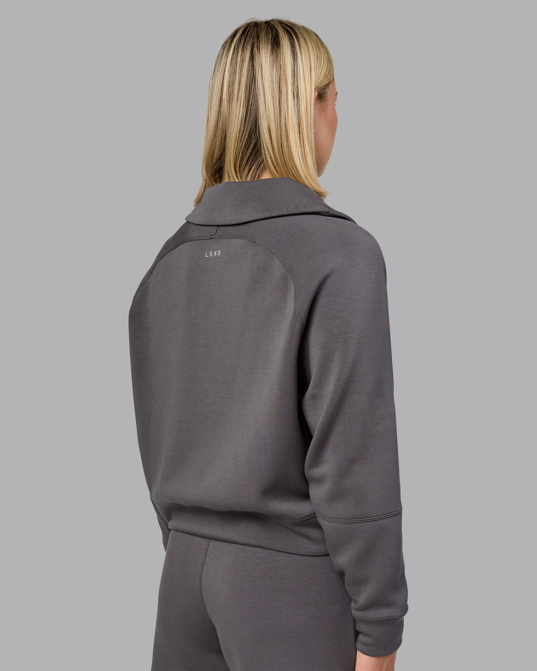 Woman wearing Elevate SoftTouch 1/2 Zip Sweater - Asphalt | Model:Halle | Size:S - view 4