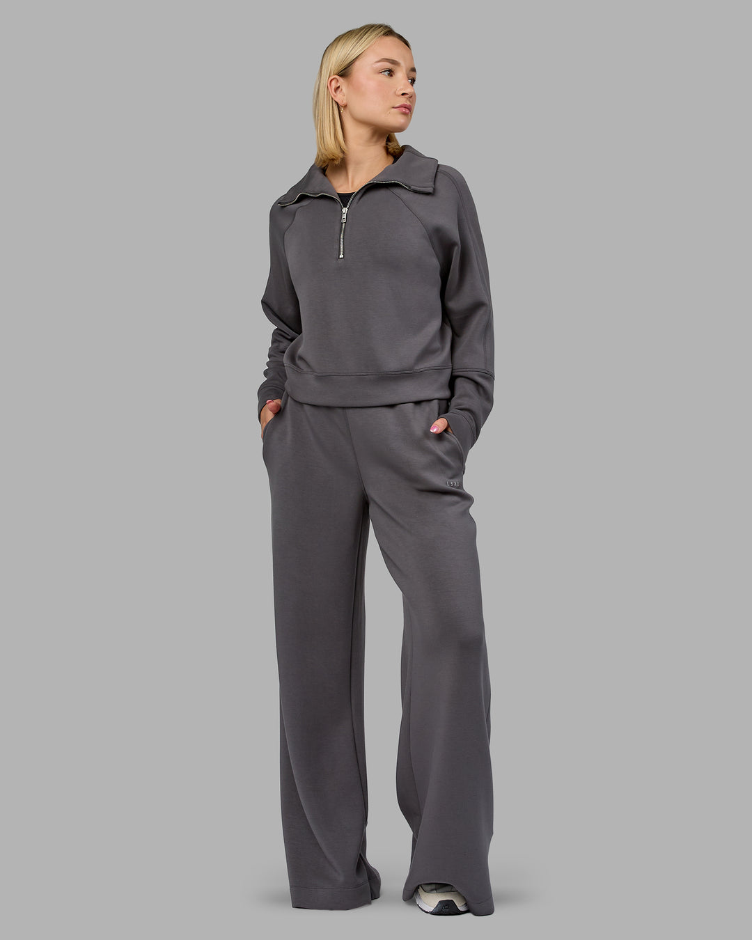 Woman wearing Elevate SoftTouch 1/2 Zip Sweater - Asphalt | Model:Halle | Size:S - view 3