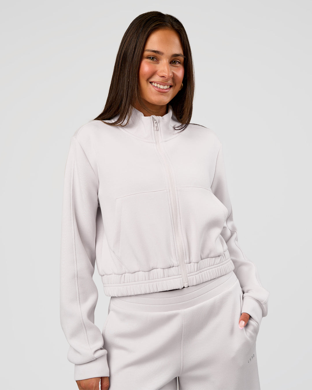 Woman wearing Elevate SoftTouch Cropped Full Zip Jacket - Clay | Model:Bianca | Size:S - view 1