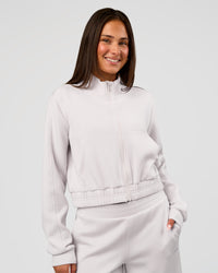 Woman wearing Elevate SoftTouch Cropped Full Zip Jacket - Clay | Model:Bianca | Size:S | Thumbnail Index: 0