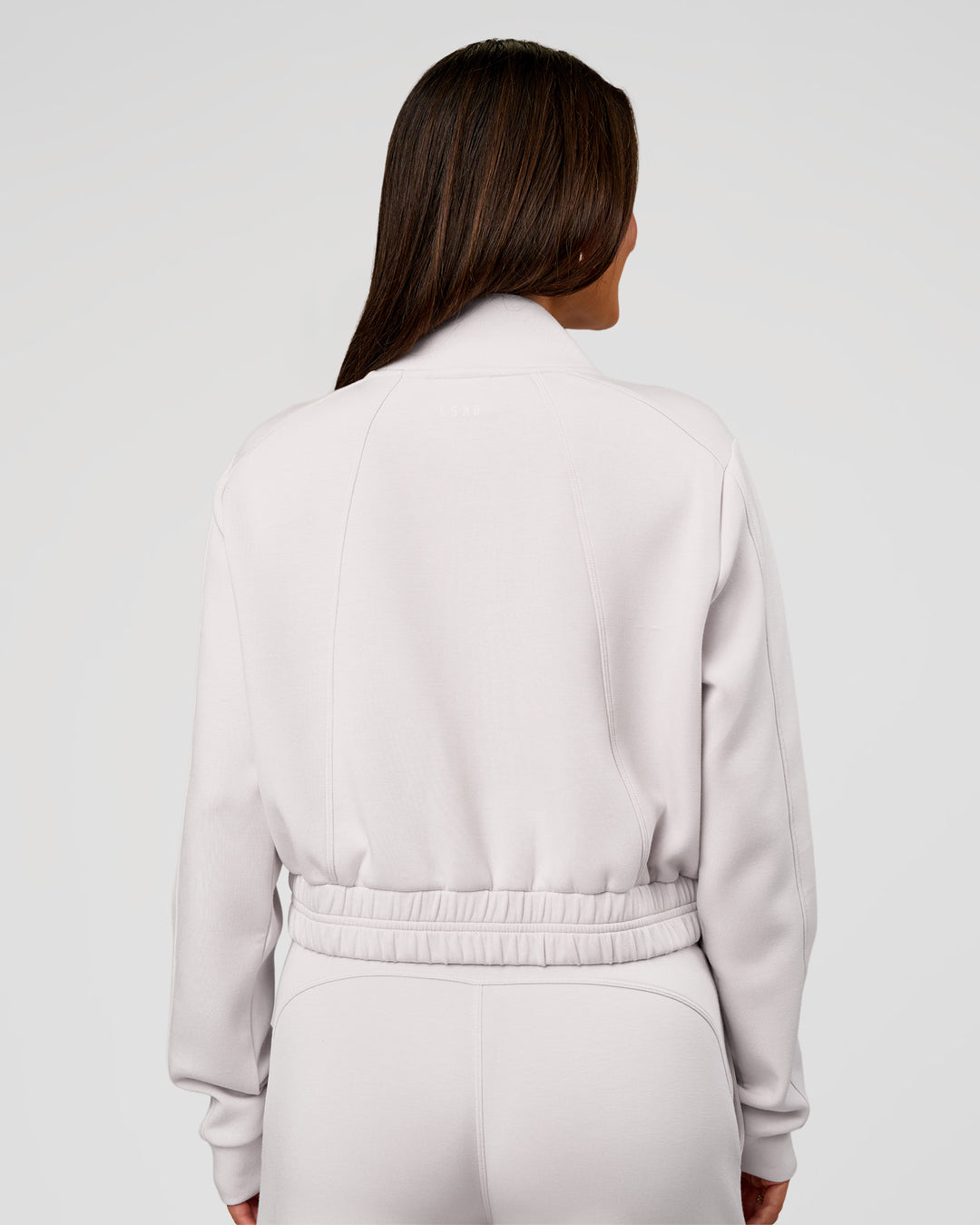 Woman wearing Elevate SoftTouch Cropped Full Zip Jacket - Clay | Model:Bianca | Size:S - view 4
