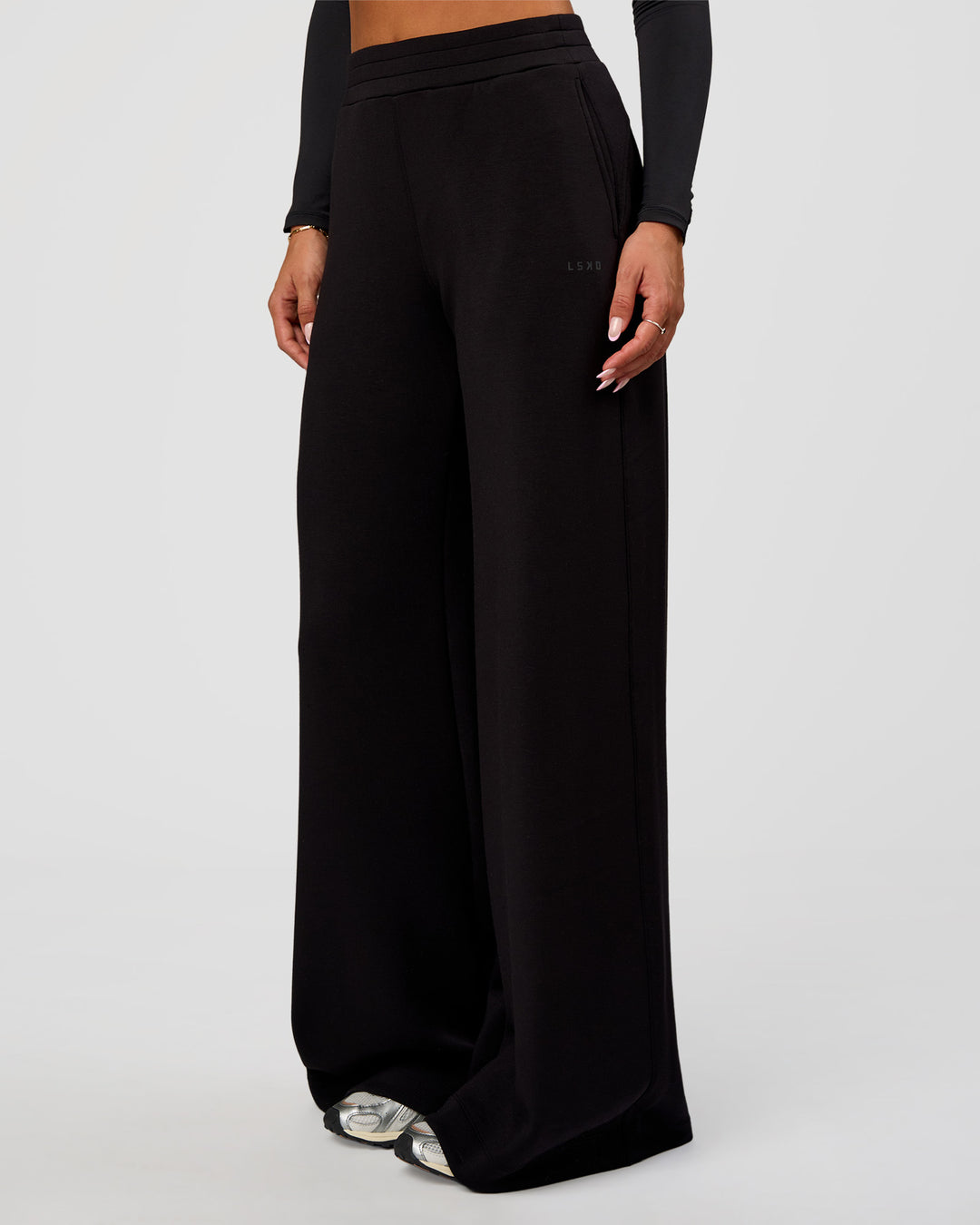 Woman wearing Elevate SoftTouch Wide Leg Pant Tall - Black | Model:Bianca | Size:S - view 1