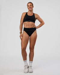 Woman wearing Elevate Sprinting Brief - Black | Model:Bree | Size:S | Thumbnail Index: 0