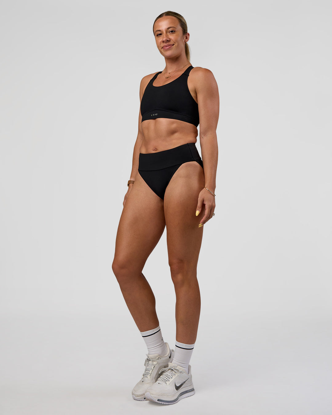 Woman wearing Elevate Sprinting Brief - Black | Model:Bree | Size:S - view 5
