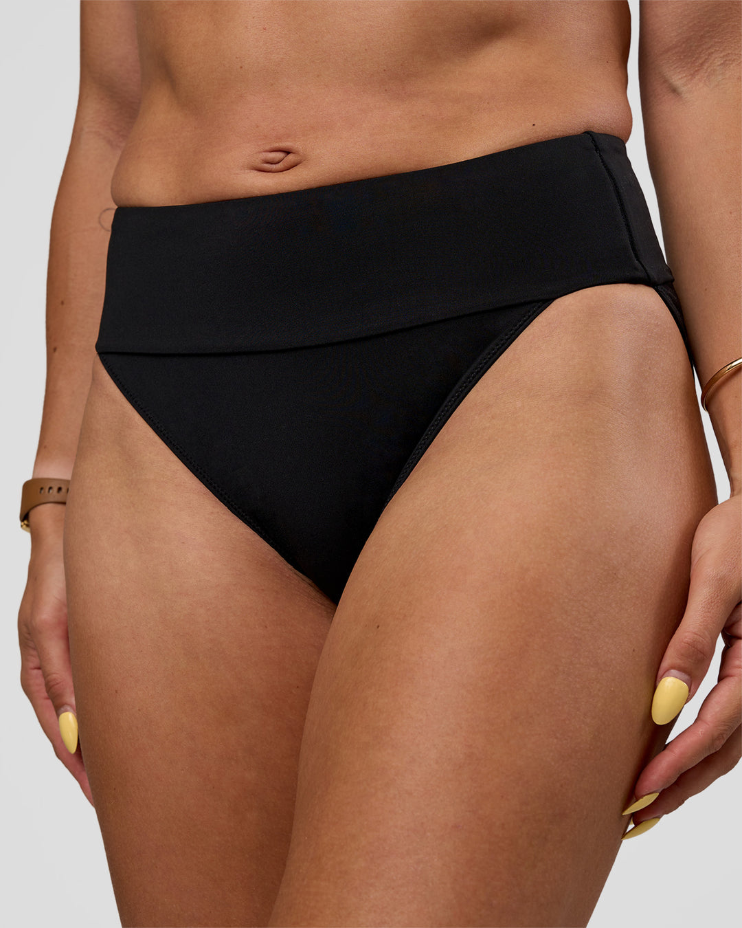 Woman wearing Elevate Sprinting Brief - Black | Model:Bree | Size:S - view 3