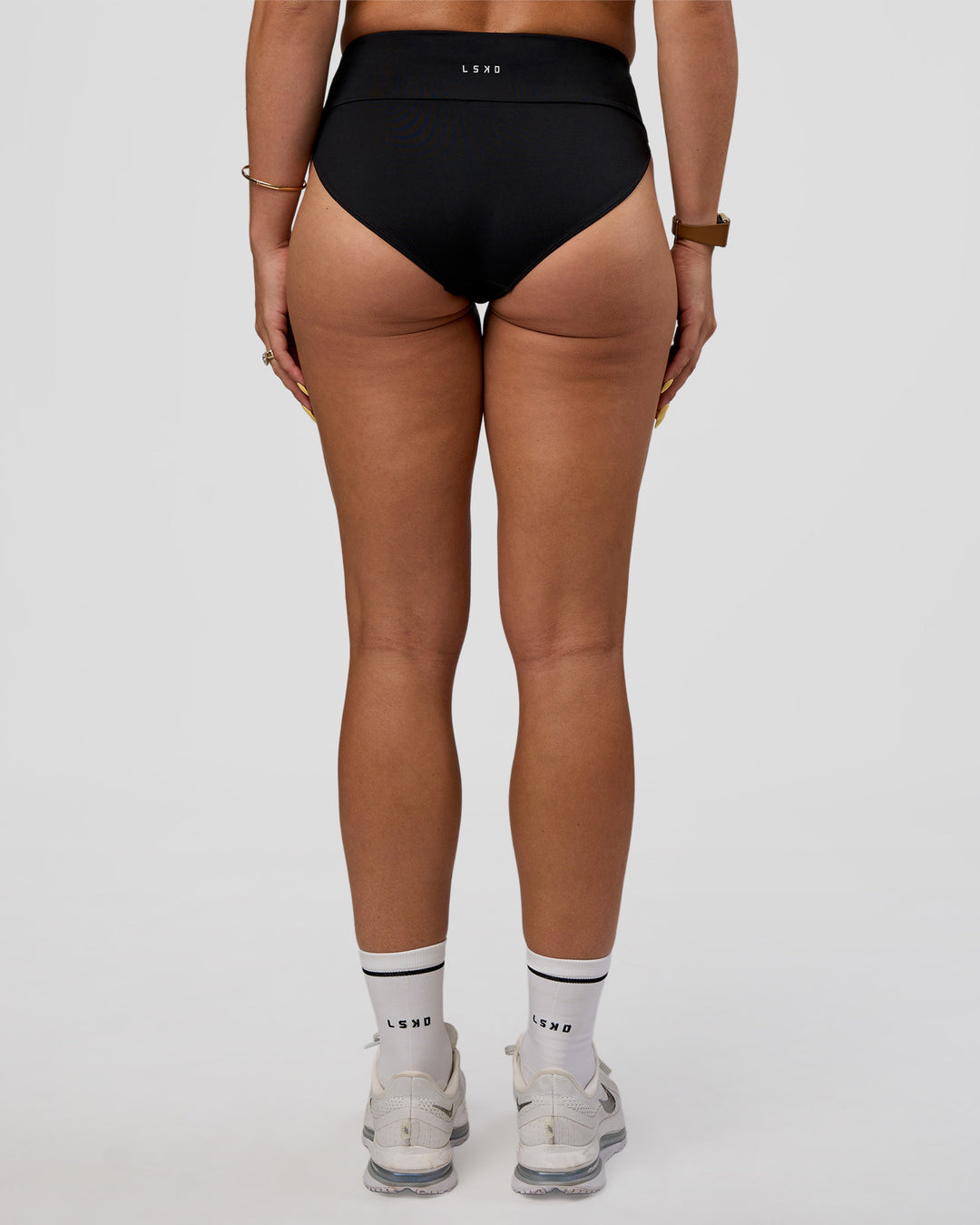 Woman wearing Elevate Sprinting Brief - Black | Model:Bree | Size:S - view 4