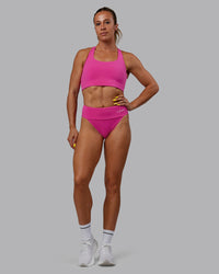 Woman wearing Elevate Sprinting Briefs - Fuchsia Pink | Thumbnail Index: 4