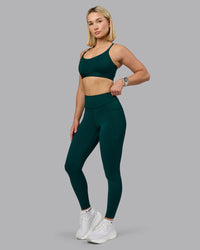 Woman wearing Elite High-Rise Full Length Legging Pockets - Dark Moss | Model:Halle | Size:S | Thumbnail Index: 4