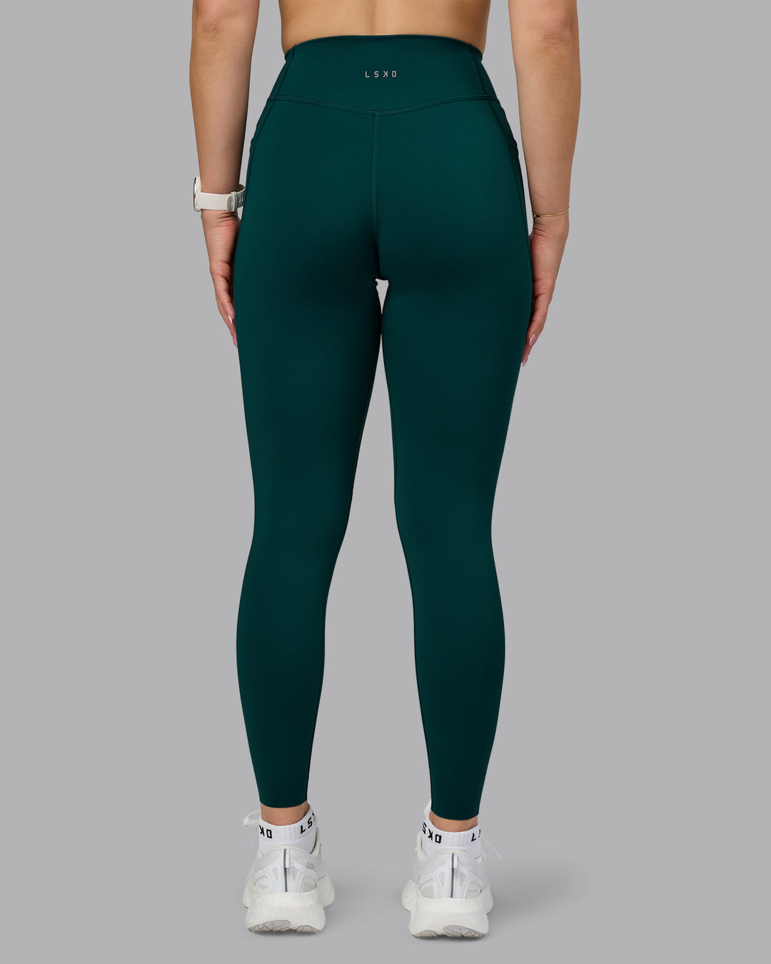Woman wearing Elite High-Rise Full Length Legging Pockets - Dark Moss | Model:Halle | Size:S - view 4
