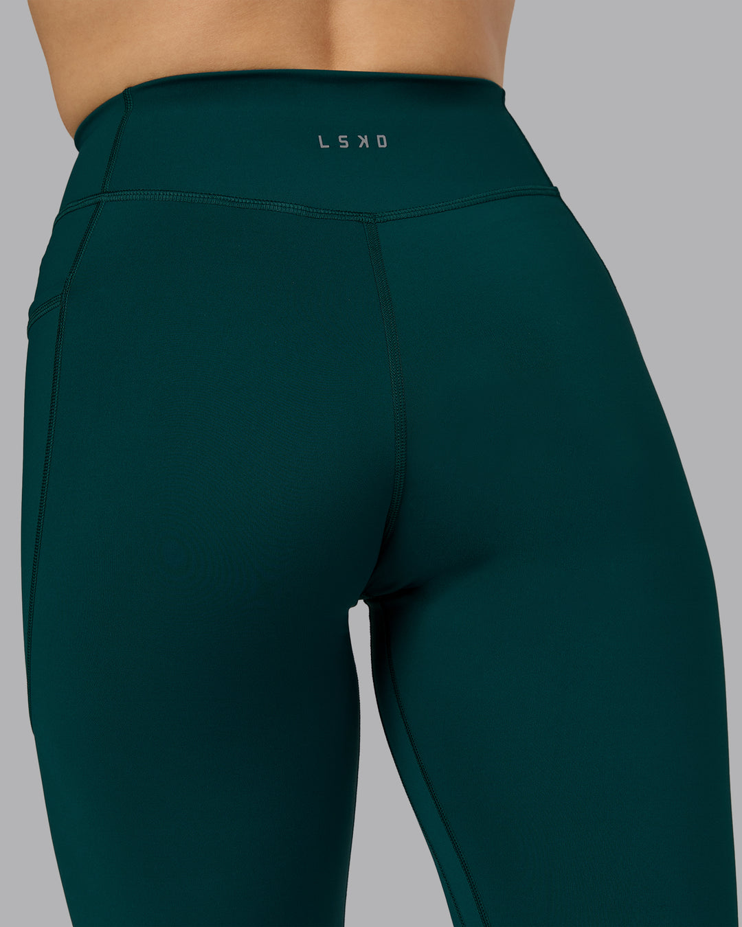 Woman wearing Elite High-Rise Full Length Legging Pockets - Dark Moss | Model:Halle | Size:S - view 8
