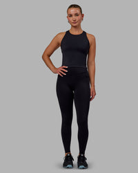 Woman wearing Elite High-Rise Full Length Legging Pockets - Black | Thumbnail Index: 4