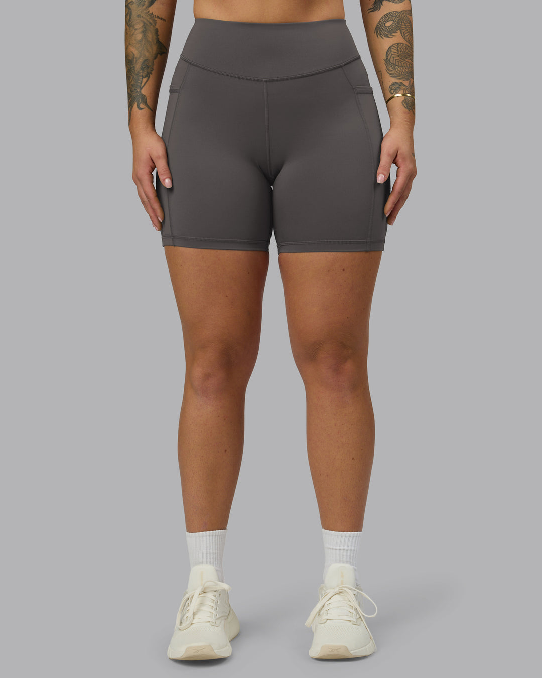Woman wearing Elite High-Rise 6" Short Pockets - Dark Storm | Model:Robyn | Size:S - view 3