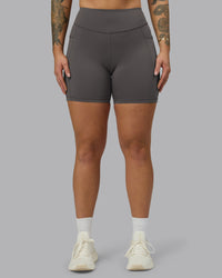 Woman wearing Elite High-Rise 6" Short Pockets - Dark Storm | Model:Robyn | Size:S | Thumbnail Index: 2