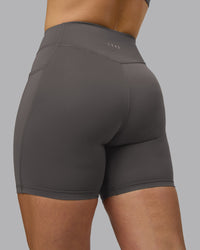 Woman wearing Elite High-Rise 6" Short Pockets - Dark Storm | Model:Robyn | Size:S | Thumbnail Index: 6