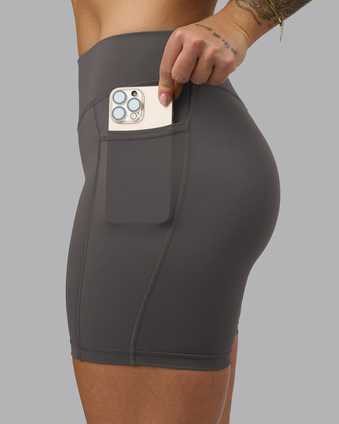 Woman wearing Elite High-Rise 6" Short Pockets - Dark Storm | Model:Robyn | Size:S - view 1