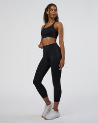 Woman wearing Elite High-Rise 7/8 Legging Pockets - Black | Model:Jordan | Size:S | Thumbnail Index: 4