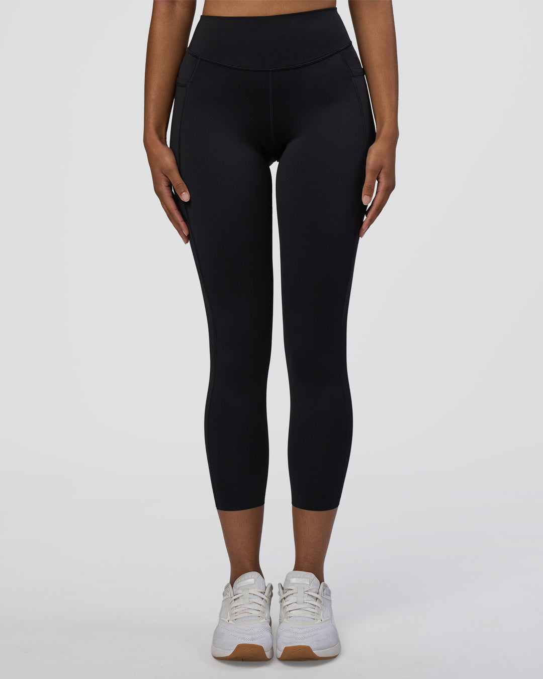 Woman wearing Elite High-Rise 7/8 Legging Pockets - Black | Model:Jordan | Size:S - view 6