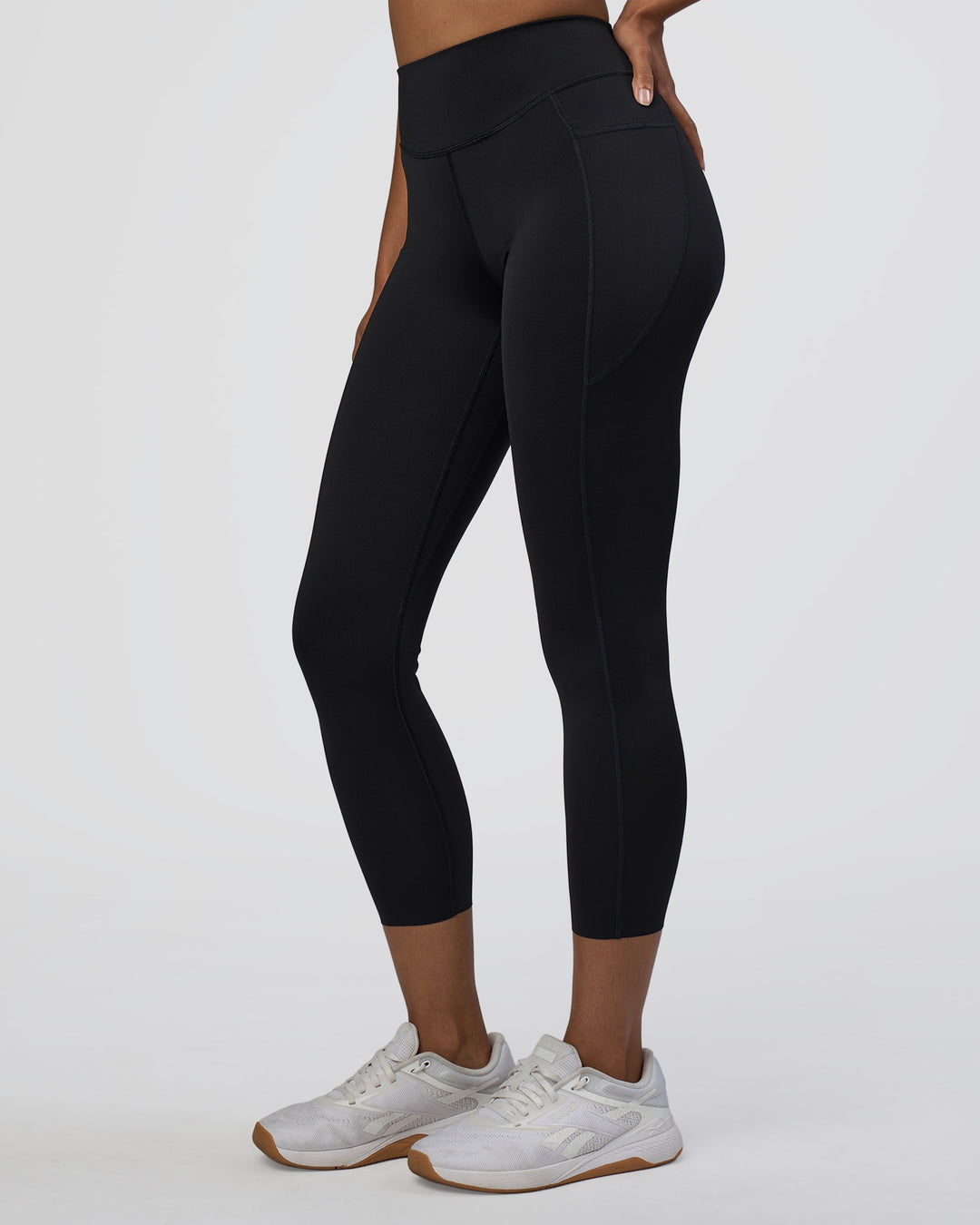 Woman wearing Elite High-Rise 7/8 Legging Pockets - Black | Model:Jordan | Size:S - view 2