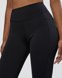 Woman wearing Elite High-Rise 7/8 Legging Pockets - Black | Model:Jordan | Size:S | Thumbnail Index: 2