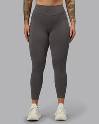 Woman wearing Elite High-Rise 7/8 Legging Pockets - Dark Storm | Model:Robyn | Size:S | Thumbnail Index: 4