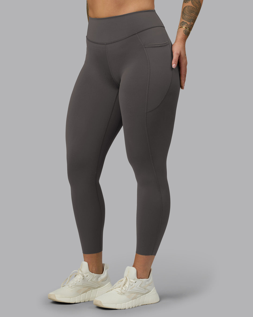 Woman wearing Elite High-Rise 7/8 Legging Pockets - Dark Storm | Model:Robyn | Size:S - view 8