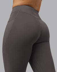 Woman wearing Elite High-Rise 7/8 Legging Pockets - Dark Storm | Model:Robyn | Size:S | Thumbnail Index: 8