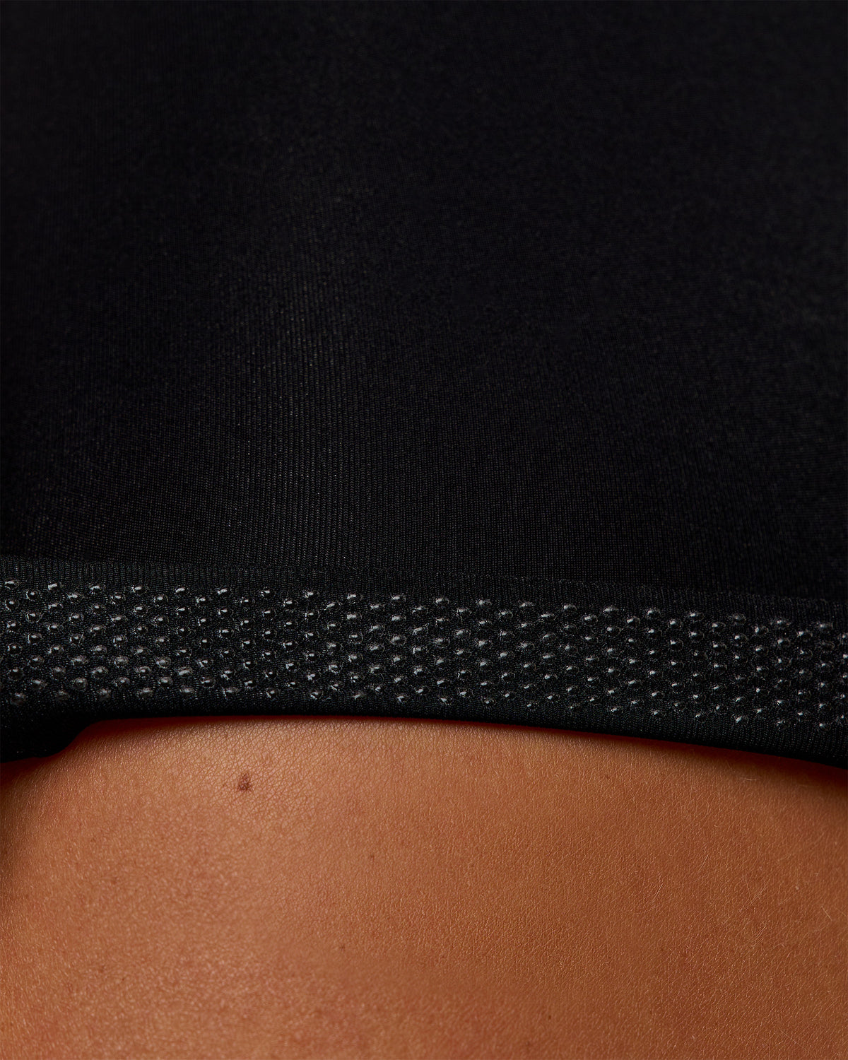 Woman wearing Elite Hype Reflective Run High-Rise 5" Short Pockets - Black-Hype Reflective | Model:Amity | Size:S