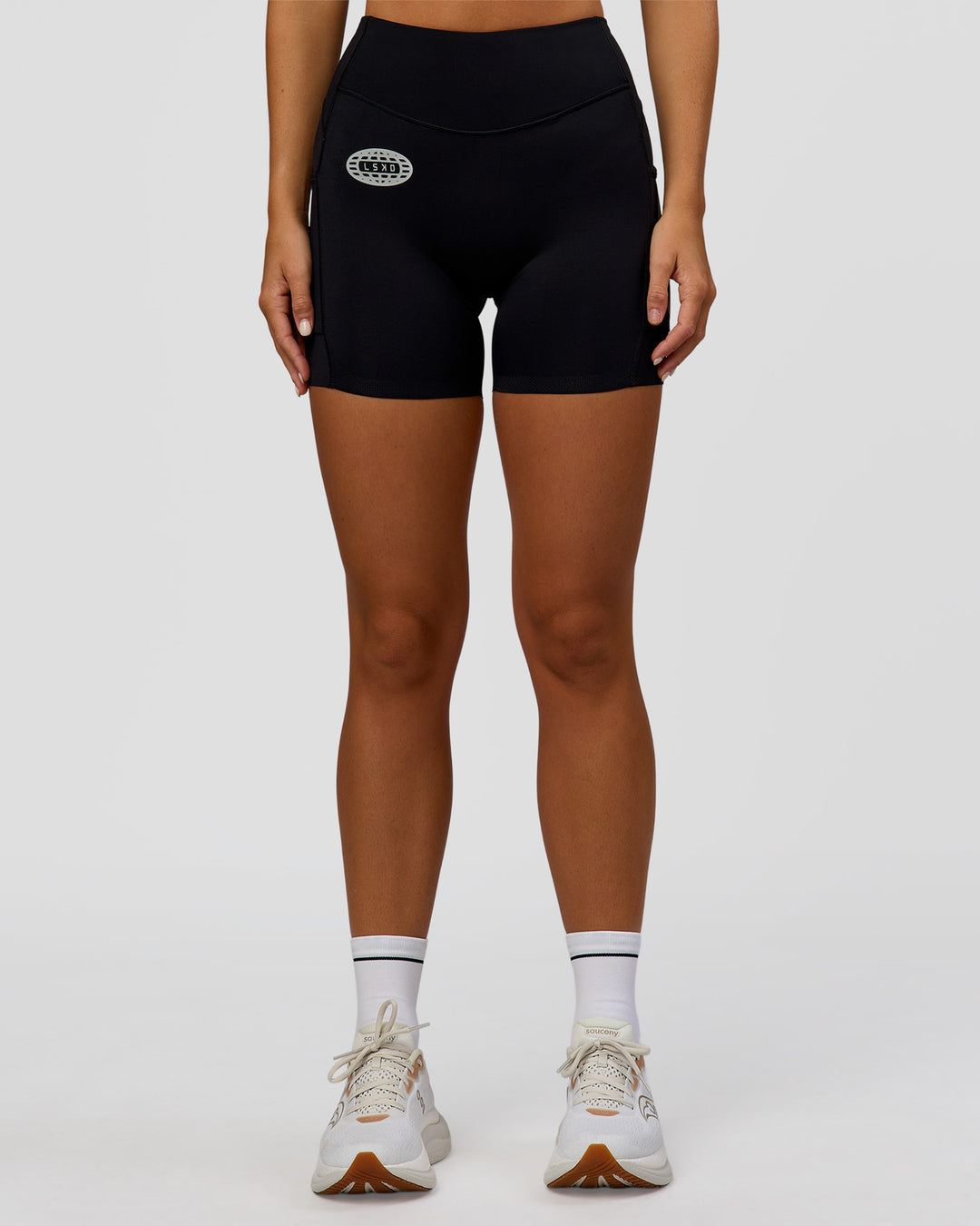 Woman wearing Elite Hype Reflective Run High-Rise 5" Short Pockets - Black-Hype Reflective | Model:Amity | Size:S - view 7