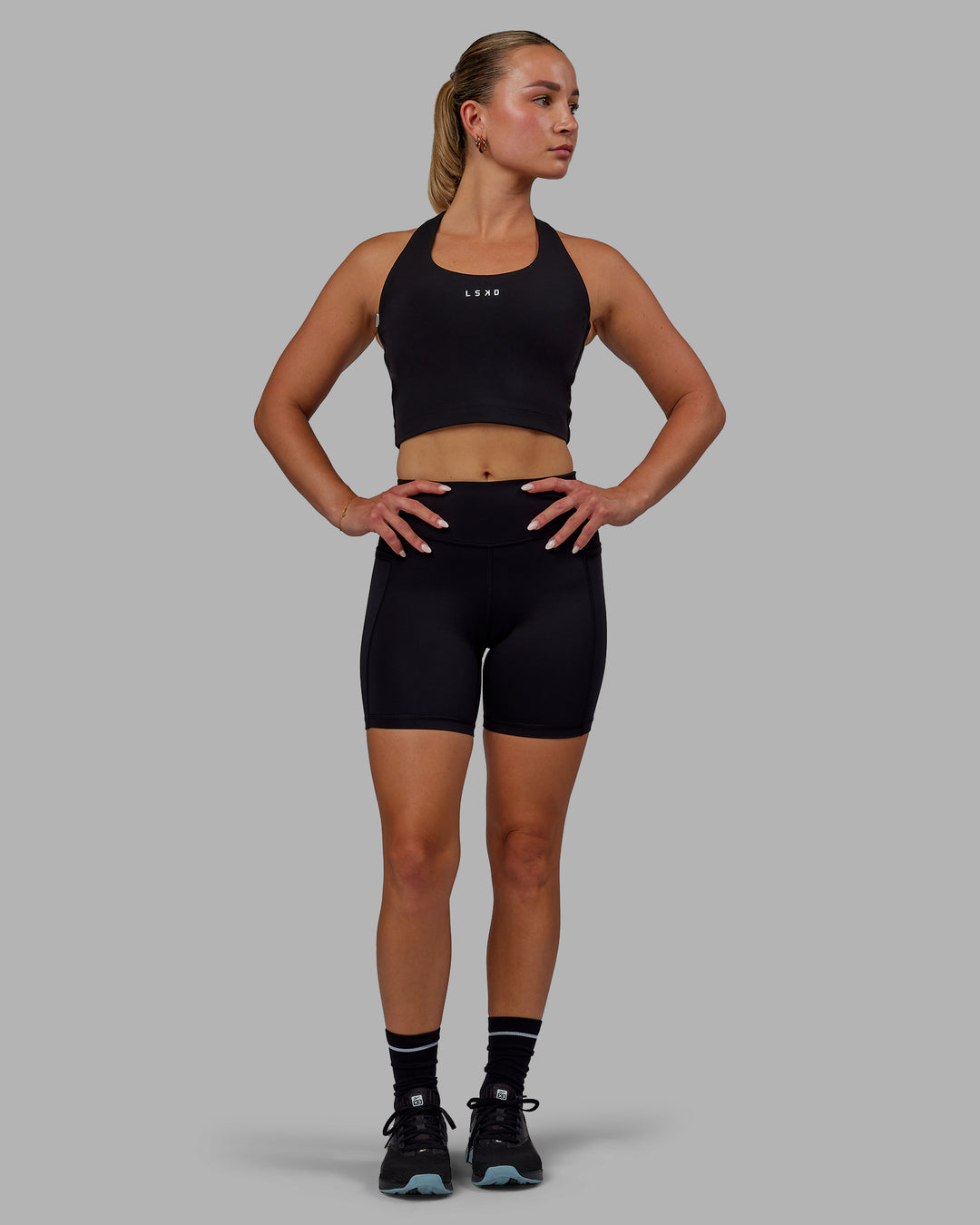 Woman wearing Elite High-Rise 6" Short Pockets - Black - view 11