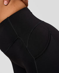 Woman wearing Elite Run High-Rise 5" Short Pockets - Black | Model:Emelia | Size:S | Thumbnail Index: 10
