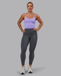 Woman wearing Elixir Ultra High-Rise 7/8 Legging Pockets - Dark Storm | Model:Lyss | Size:S | Thumbnail Index: 0