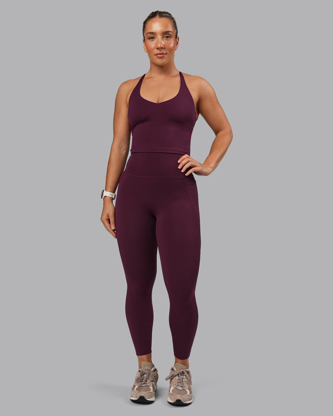 Woman wearing Elixir Ultra High-Rise 7/8 Legging Pockets - Cherry Lacquer | Model:Lyss | Size:S - view 2