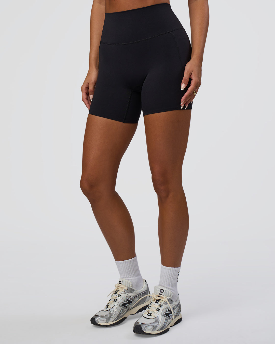 Woman wearing Elixir Defined High-Rise 6" Short Pockets - Black | Model:Bianca | Size:S - view 7