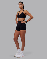 Woman wearing Elixir High-Rise 4" Short - Black | Model:Rhiley | Size:S | Thumbnail Index: 4