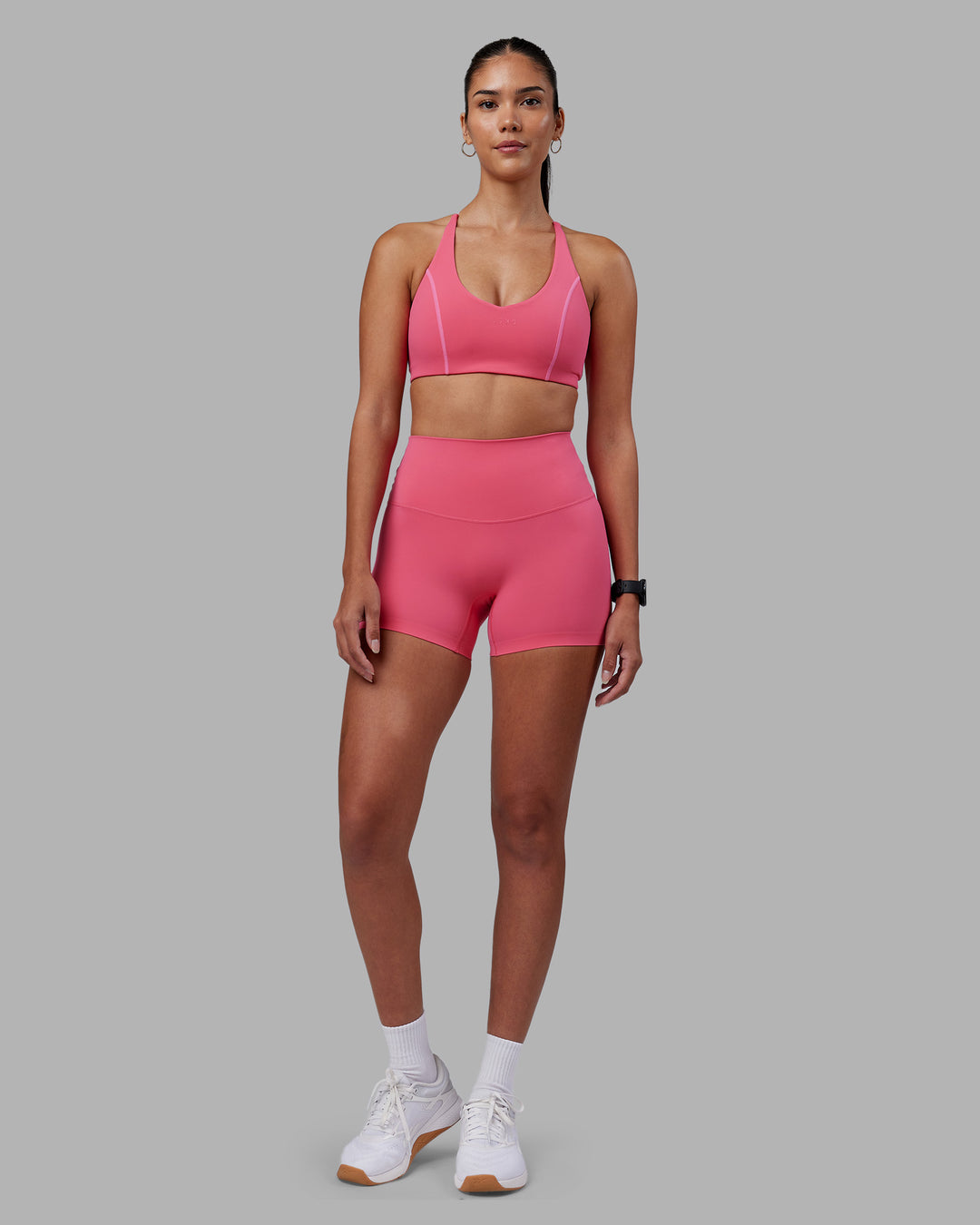 Woman wearing Elixir High-Rise 4" Short - Hot Pink | Model:Rhiley | Size:S - view 5