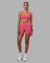 Woman wearing Elixir High-Rise 4" Short - Hot Pink | Model:Rhiley | Size:S | Thumbnail Index: 4