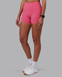 Woman wearing Elixir High-Rise 4" Short - Hot Pink | Model:Rhiley | Size:S | Thumbnail Index: 5