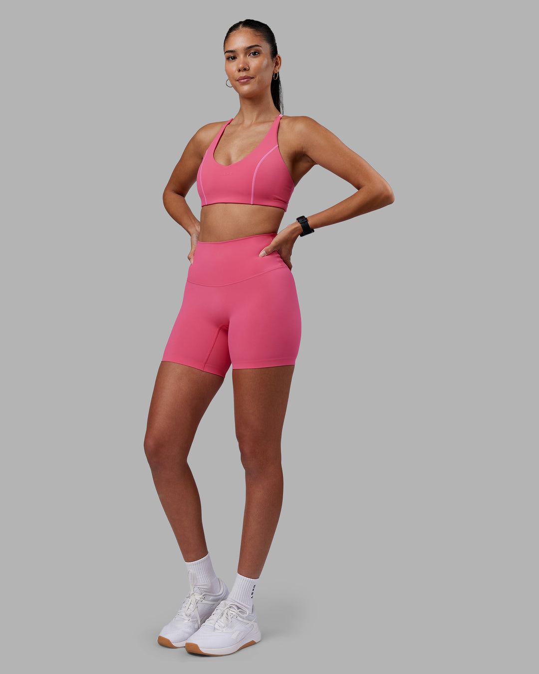 Woman wearing Elixir High-Rise 6" Short - Hot Pink | Model:Rhiley | Size:S - view 5